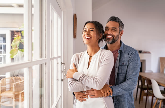 A smiling couple at home