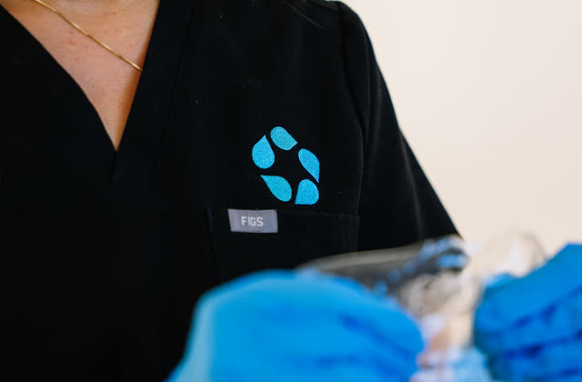 A Relive Health clinician prepares a lab draw