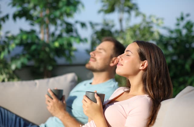 A relaxed couple with morning coffee